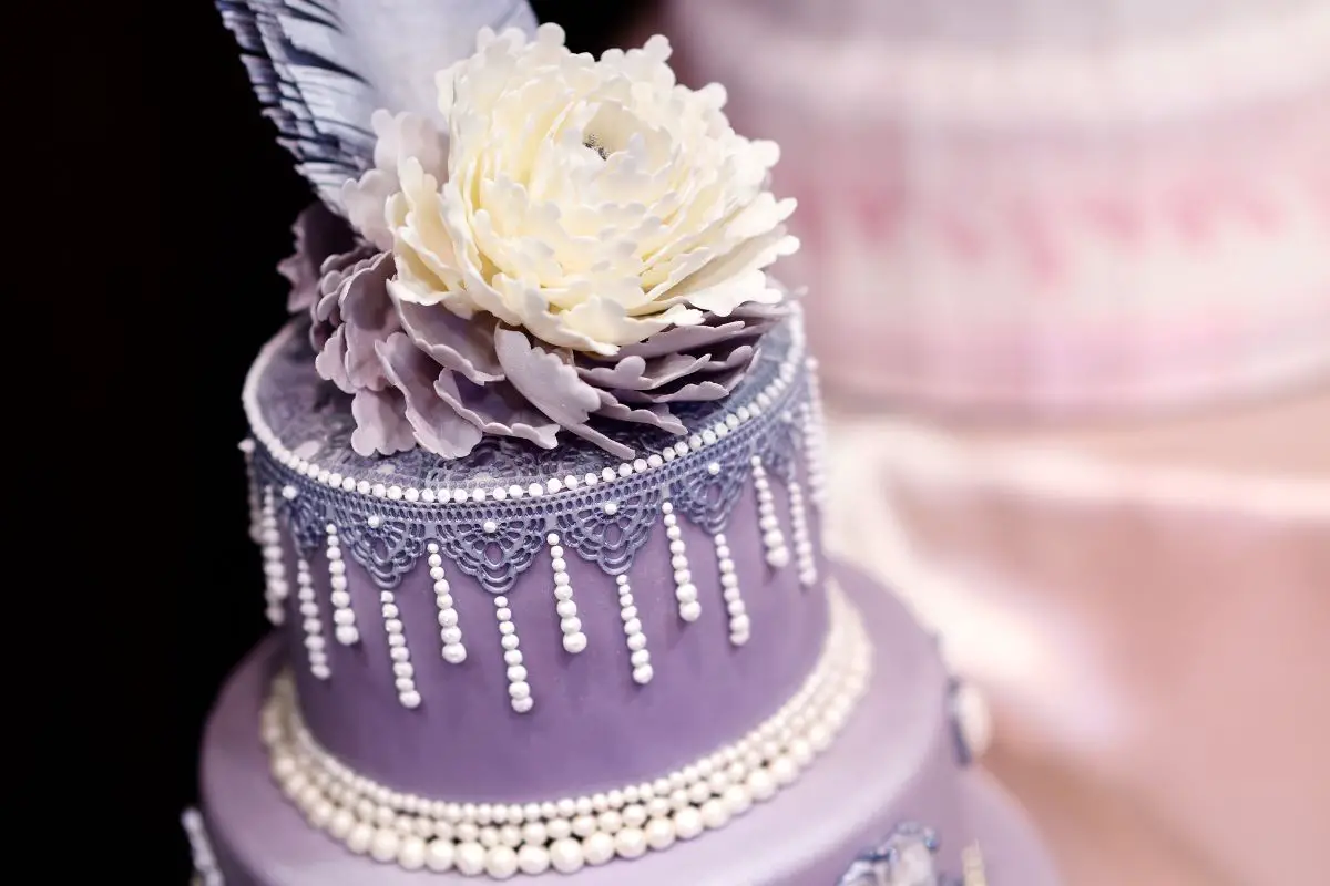 Delicious decorated lavender cake isolated on transparent background  27144243 PNG